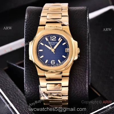 Copy Patek Philippe Nautilus Womens Yellow Gold and Blue  Swiss Quality
